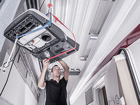 RV technician with A/C unit - RVTI Training